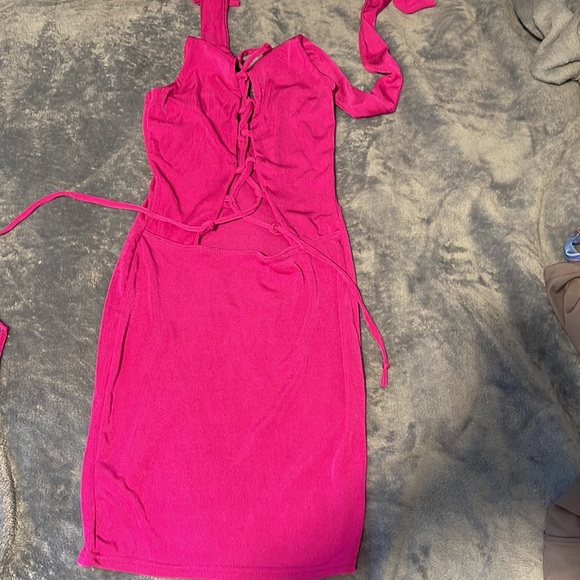 Hot Pink mini dress with crisscross in the cleavage area down to the front. - Picture 6 of 6